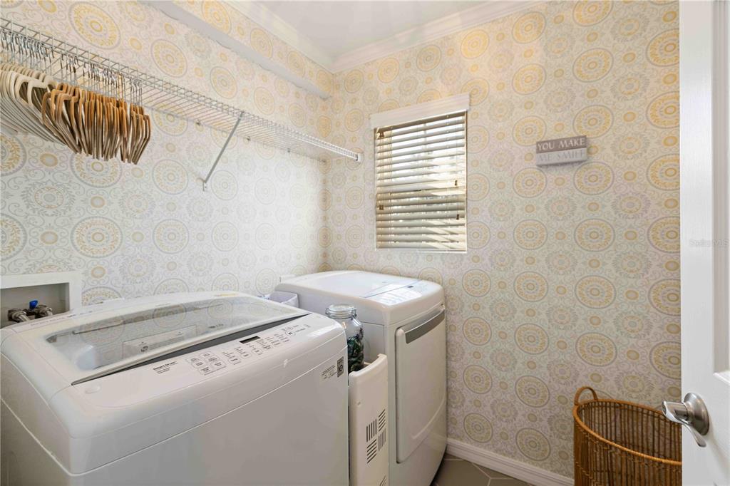 9040 White Sage Loop Lakewood Ranch, FL 34202 - Photo 27 of 59 a utility room with dryer and washer