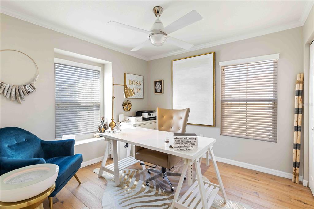 9040 White Sage Loop Lakewood Ranch, FL 34202 - Photo 46 of 59 a work room with furniture wooden floor and a window
