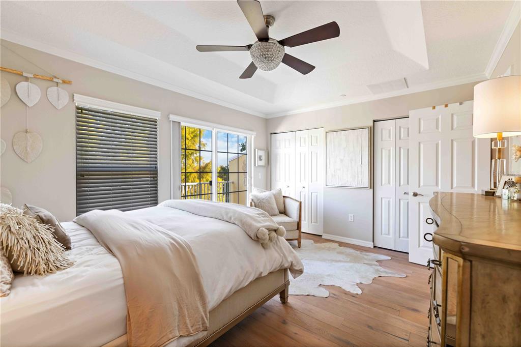 9040 White Sage Loop Lakewood Ranch, FL 34202 - Photo 50 of 59 a bedroom with a bed dresser and a window