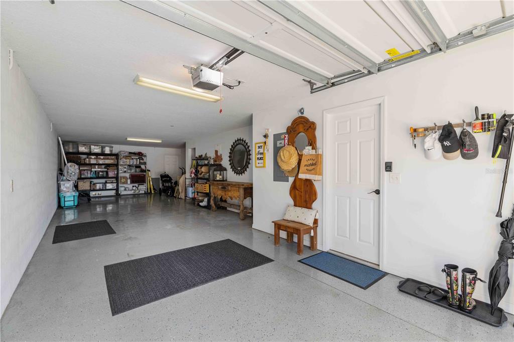 9040 White Sage Loop Lakewood Ranch, FL 34202 - Photo 55 of 59 a gym room with gym equipment and a window