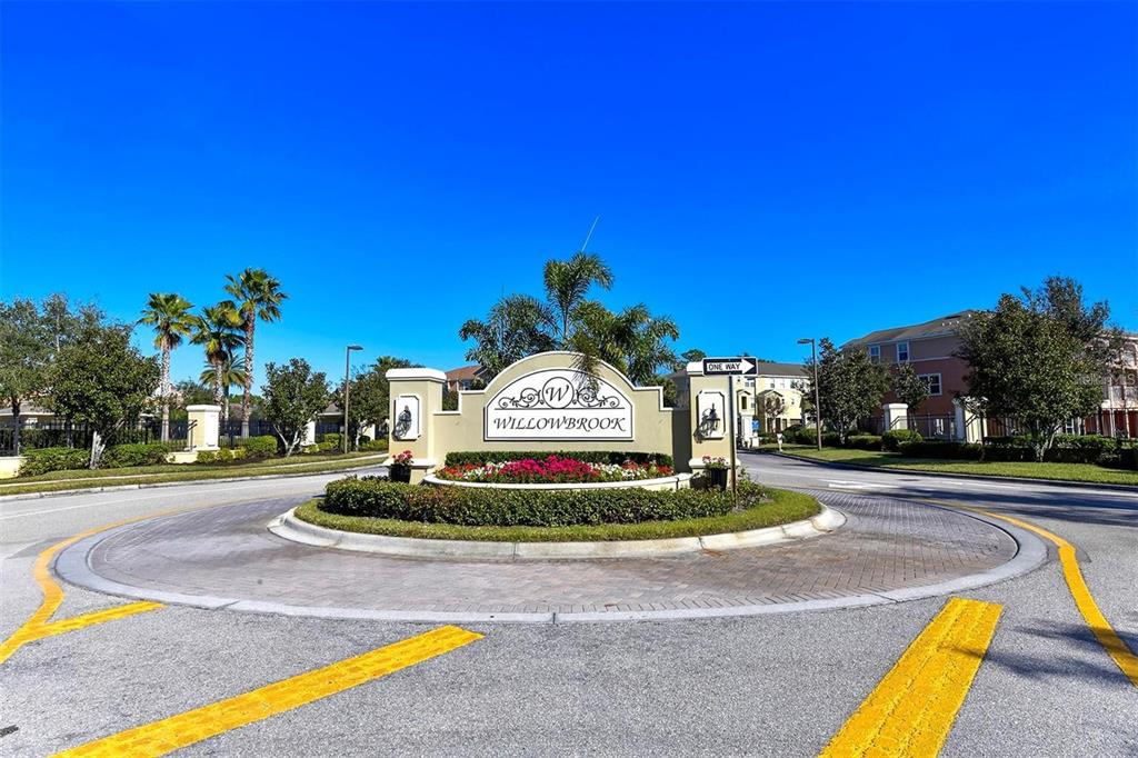 9040 White Sage Loop Lakewood Ranch, FL 34202 - Photo 56 of 59 a view of a swimming pool with a yard