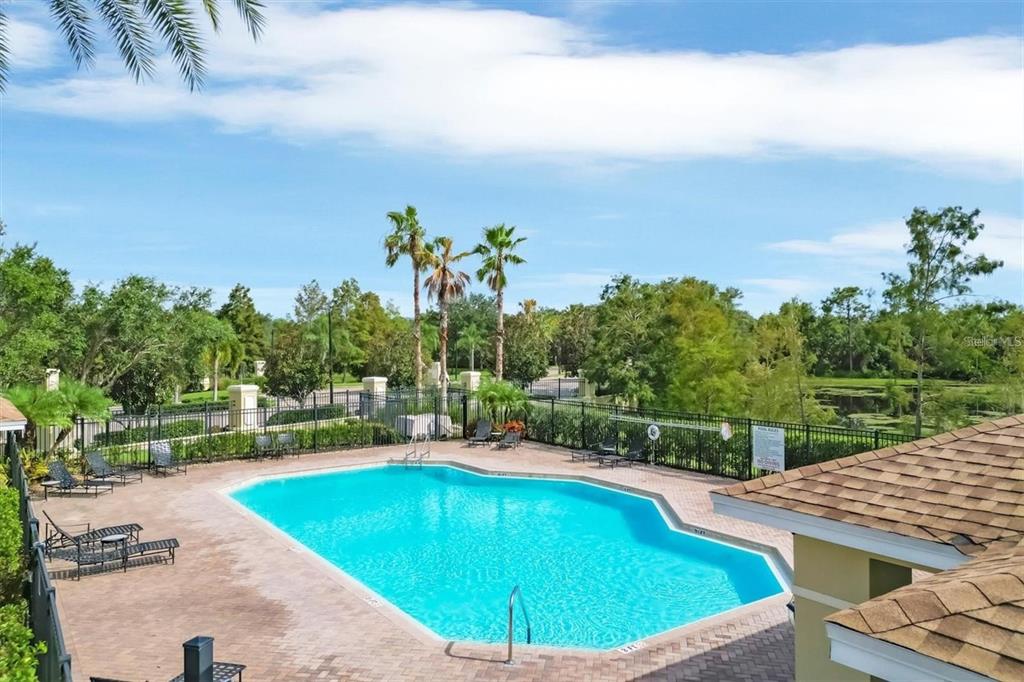 9040 White Sage Loop Lakewood Ranch, FL 34202 - Photo 59 of 59 a view of a swimming pool with a yard