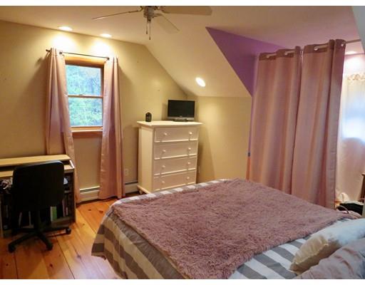 208 Reservoir Road Westhampton, MA 01027 - Photo 15 of 30 a bedroom with a bed and a window
