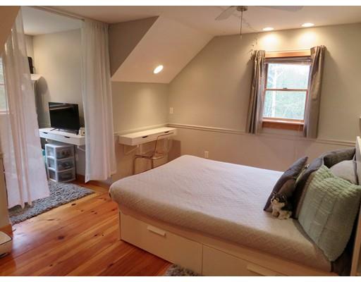 208 Reservoir Road Westhampton, MA 01027 - Photo 16 of 30 a bedroom with a bed and a television in it