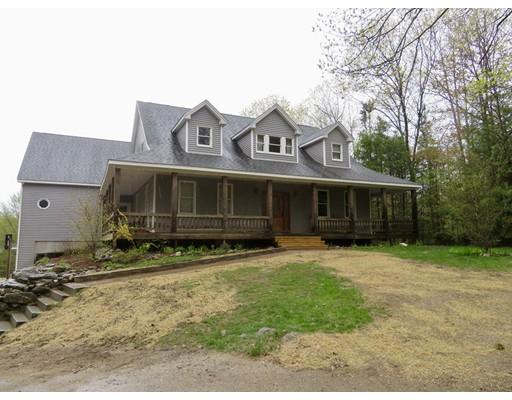 208 Reservoir Road Westhampton, MA 01027 - Photo 2 of 30 a front view of a house with a garden