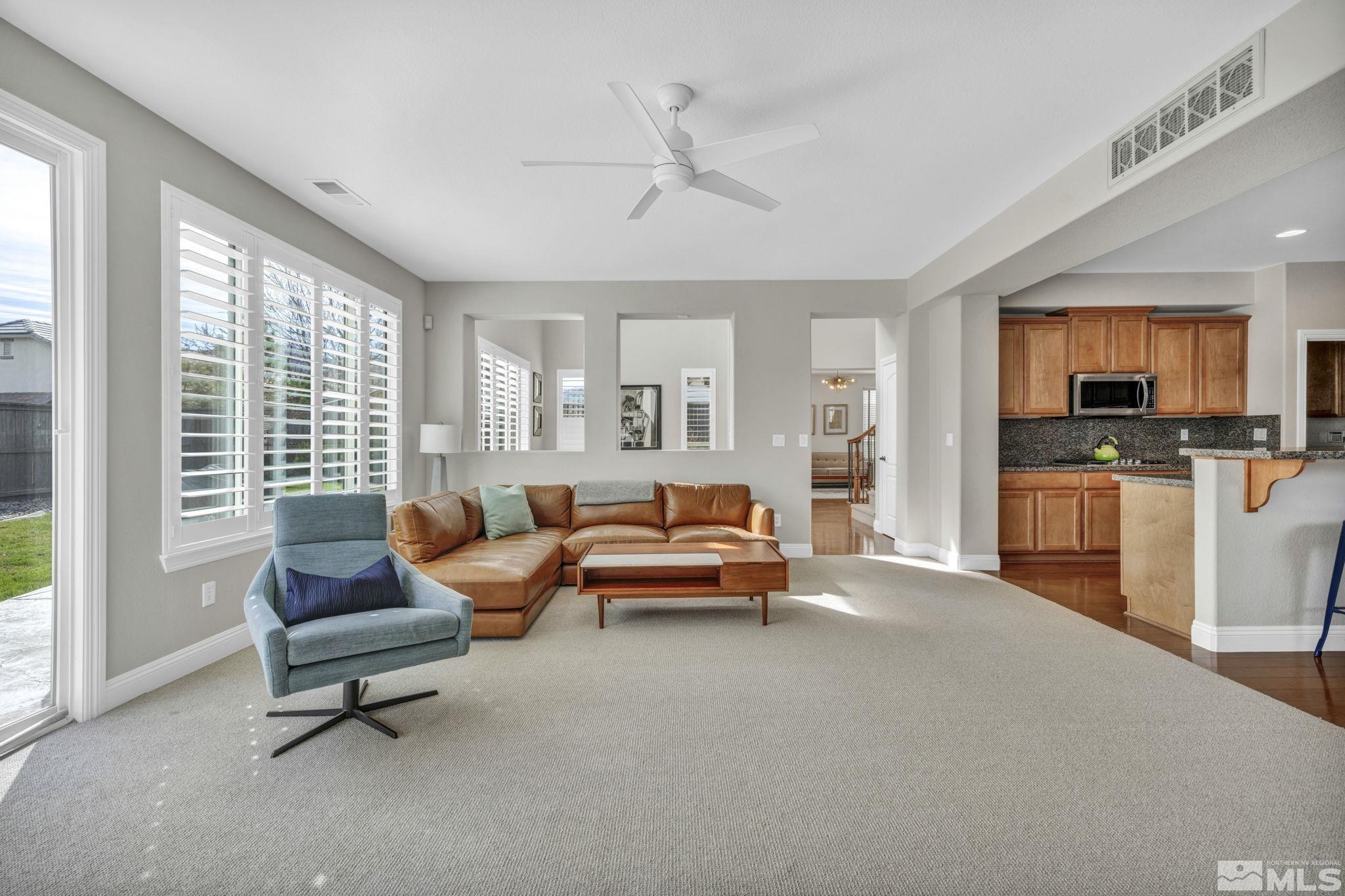 665 Paso Fino Court Reno, NV 89521 - Photo 12 of 40 a living room with furniture and a large window