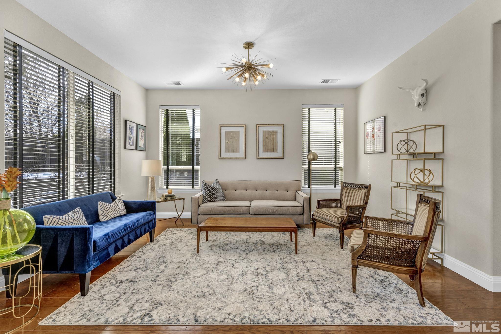 665 Paso Fino Court Reno, NV 89521 - Photo 23 of 40 a living room with furniture and a potted plant