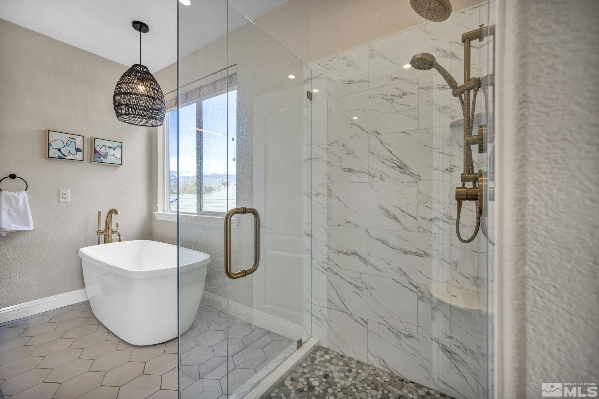 665 Paso Fino Court Reno, NV 89521 - Photo 30 of 40 a bathroom with a sink toilet and shower