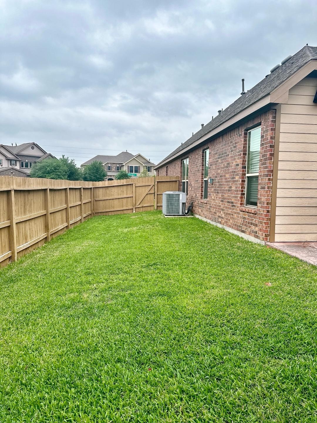 1110 Penny Ranch Lane Katy, TX 77494 - Photo 31 of 31 a view of a backyard with a garden