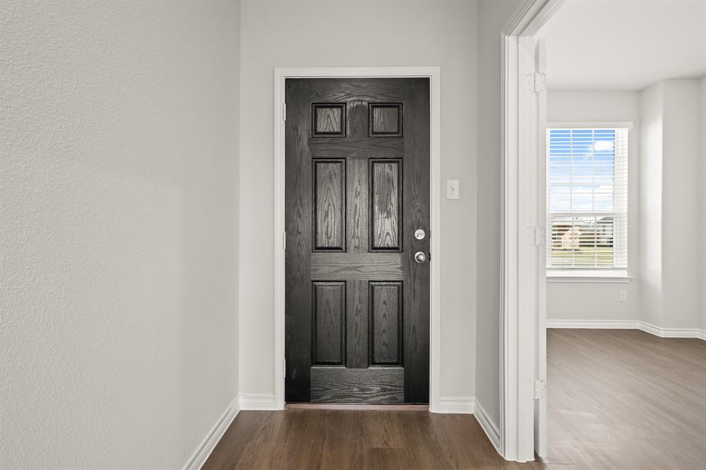 5025 Wellborn Road Crowley, TX 76036 - Photo 3 of 38 an entryway at a house with a door