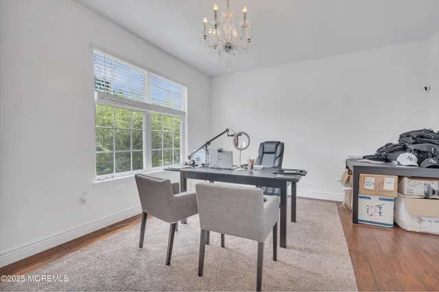 a view of a swimming pool with a yard