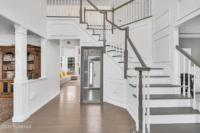 a view of a dining room with furniture and window