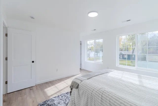 a bathroom with a shower and a bath tub