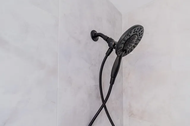 a close view of a utility room with dryer and washer