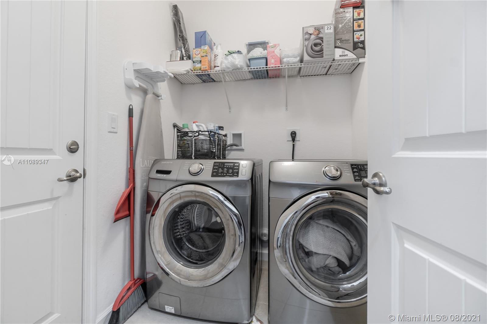 12119 Southwest 253rd Street Homestead, FL 33032 - Photo 41 of 46 a utility room with dryer and washer