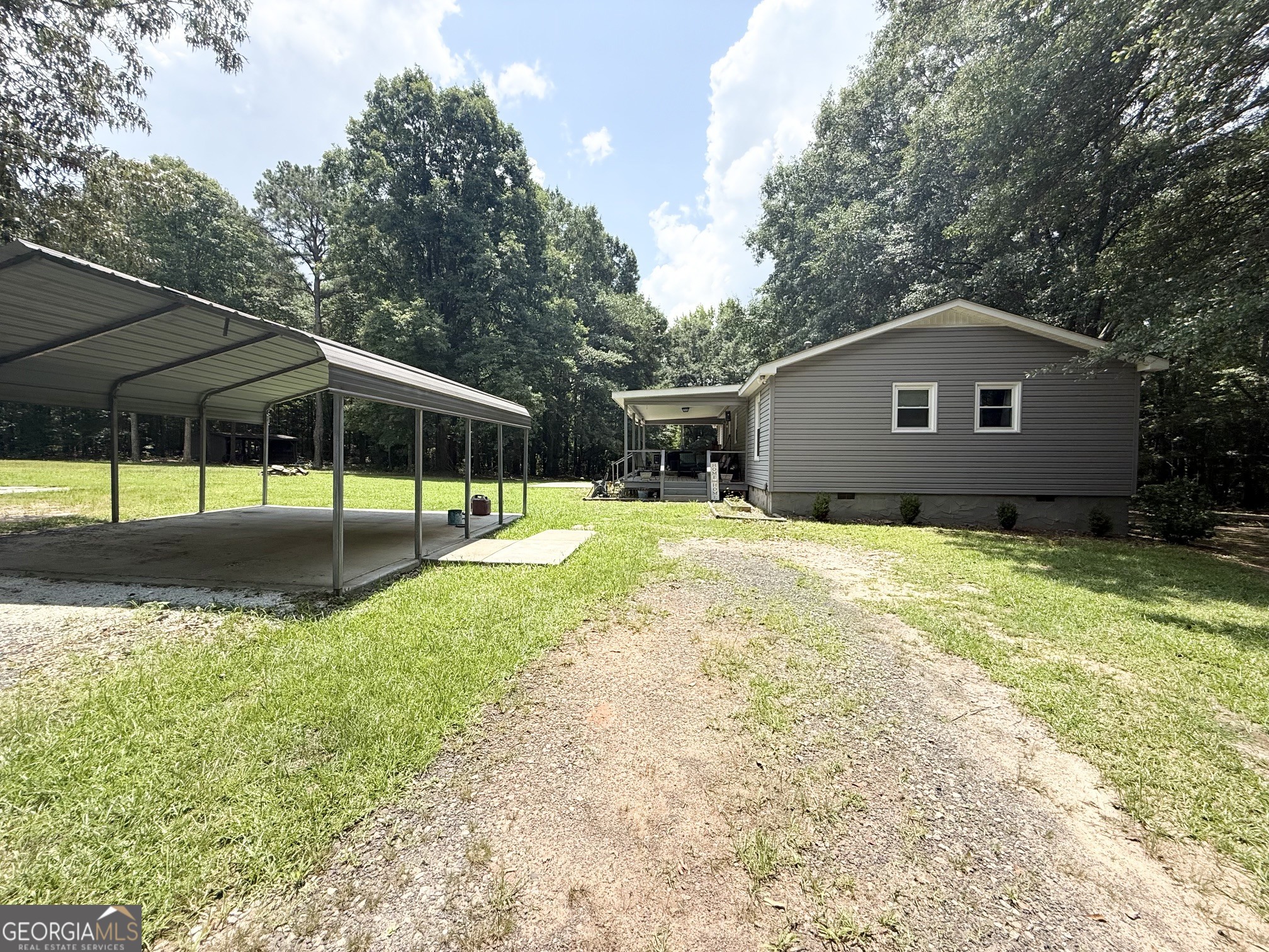 62 Melvin Harris Road Manchester, GA 31816 - Photo 50 of 52 a view of a house with a yard