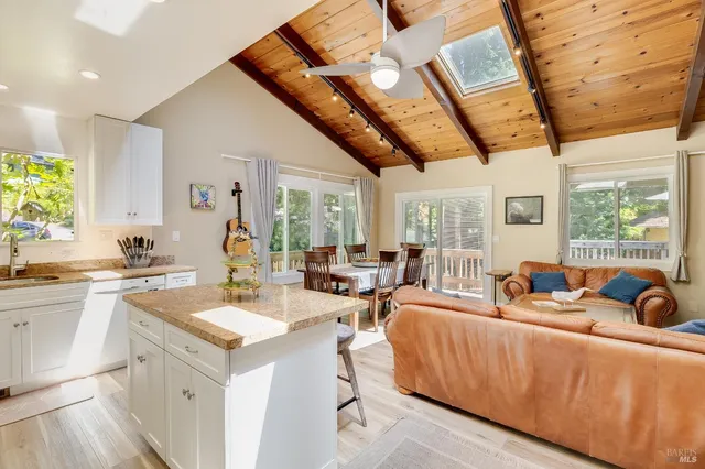a view of a garage with a tree