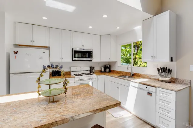 a view of a large body of water with a building in the background