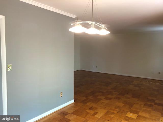 15 Cross Keys Road, Unit E Baltimore, MD 21210 - Photo 17 of 35 Dining Room flows to spacious Living Room