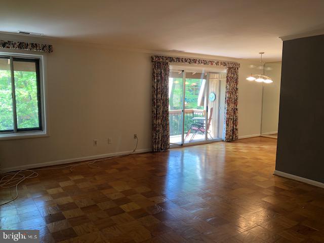 15 Cross Keys Road, Unit E Baltimore, MD 21210 - Photo 19 of 35 Living Room, Dining Room with Sliders to Balcony