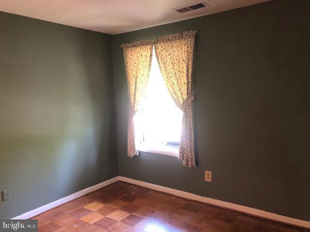 15 Cross Keys Road, Unit E Baltimore, MD 21210 - Photo 26 of 35 Second Bedroom w/ wood floors