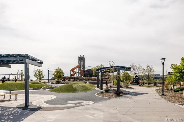 a view of a street with a building in the background