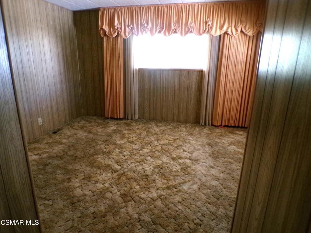 250 East Telegraph Road, Unit 220 Fillmore, CA 93015 - Photo 15 of 24 a view of an empty room with a window