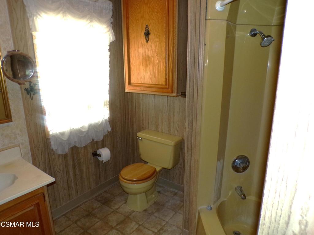 250 East Telegraph Road, Unit 220 Fillmore, CA 93015 - Photo 19 of 24 a bathroom with a toilet and a shower