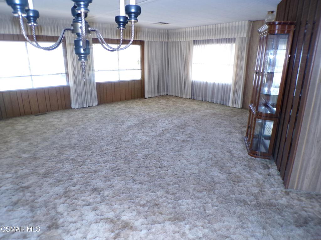 250 East Telegraph Road, Unit 220 Fillmore, CA 93015 - Photo 6 of 24 a view of empty room with windows