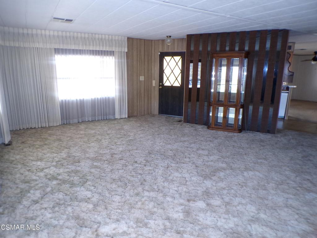 250 East Telegraph Road, Unit 220 Fillmore, CA 93015 - Photo 9 of 24 an empty room with windows and closet
