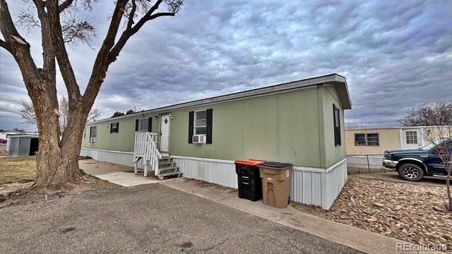 1212 Reed Lane La Junta, CO 81050 - Photo 2 of 23 a view of a car in front of a house