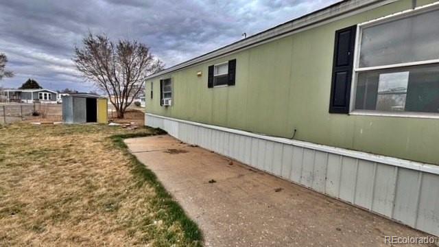 1212 Reed Lane La Junta, CO 81050 - Photo 3 of 23 a pathway of a house with a yard