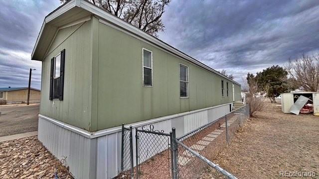 1212 Reed Lane La Junta, CO 81050 - Photo 4 of 23 a view of a house