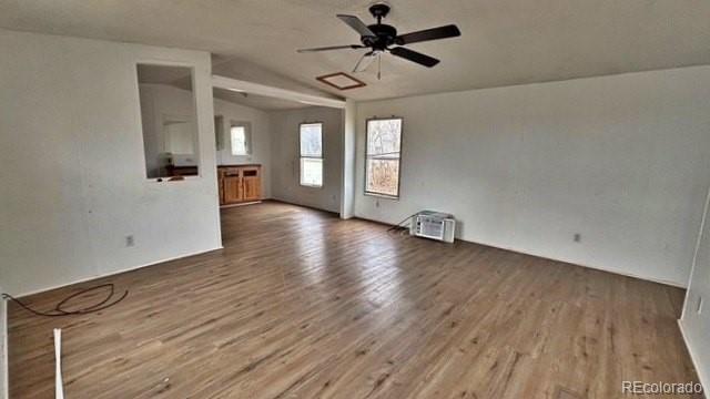 1212 Reed Lane La Junta, CO 81050 - Photo 5 of 23 a view of livingroom with hardwood floor and a ceiling fan