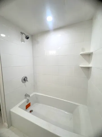 a bathroom with a bathtub