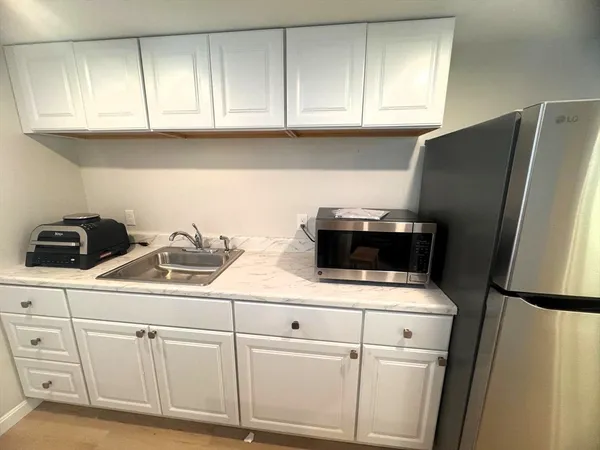 a stove top oven sitting on top of a counter