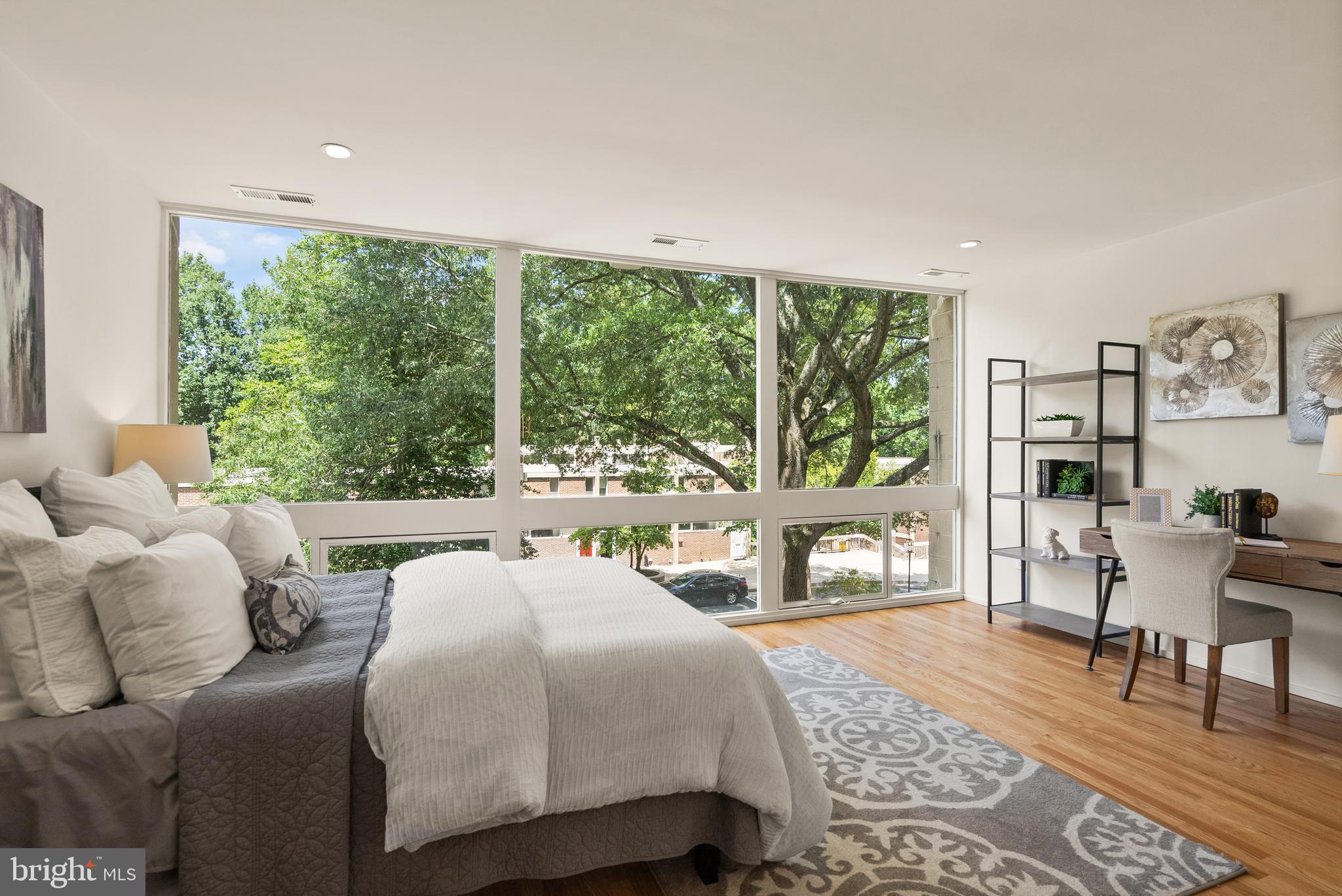 11519 Hickory Cluster Reston, VA 20190 - Photo 17 of 28 a living room with furniture and a large window