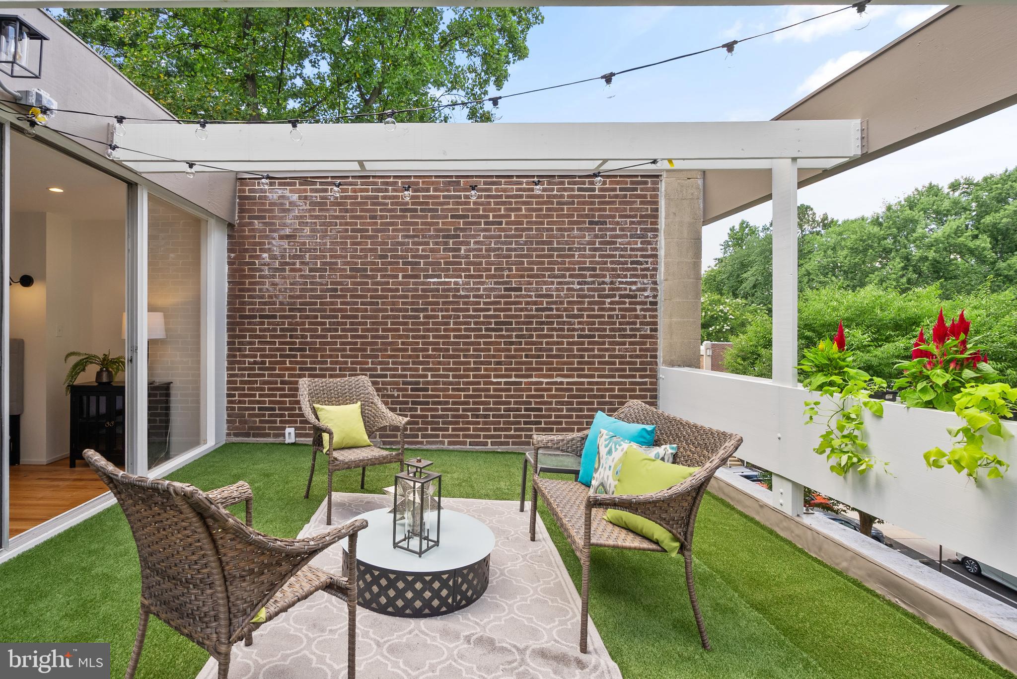 11519 Hickory Cluster Reston, VA 20190 - Photo 20 of 28 a view of a patio with couple of chairs