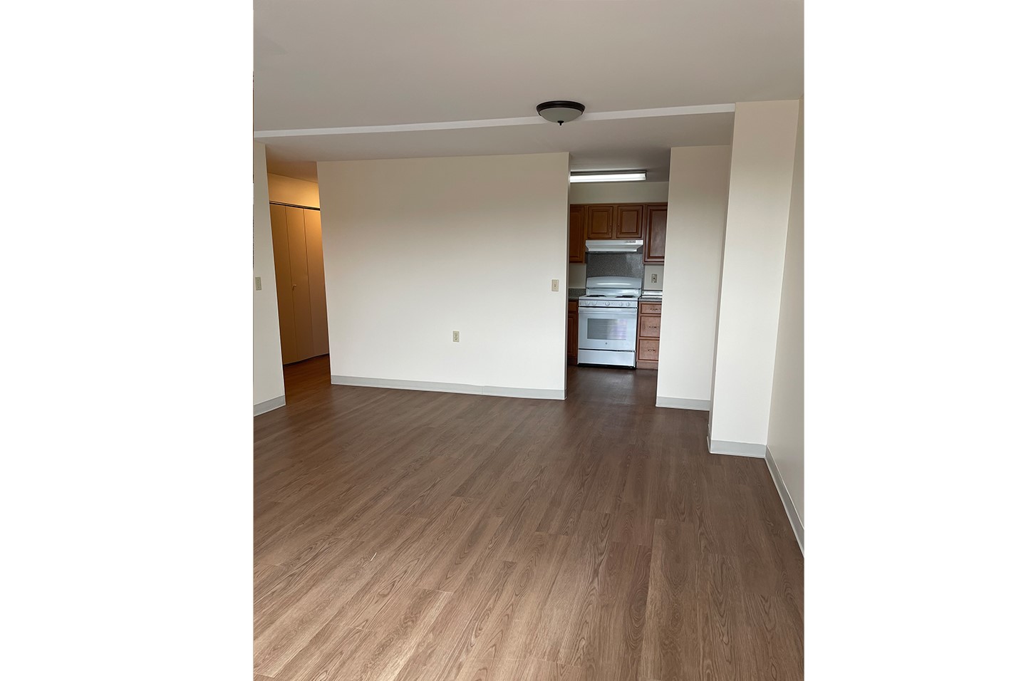 5 Green Street, Unit 100 Dover, NH 03820 - Photo 5 of 10 a view of a hallway with wooden floor