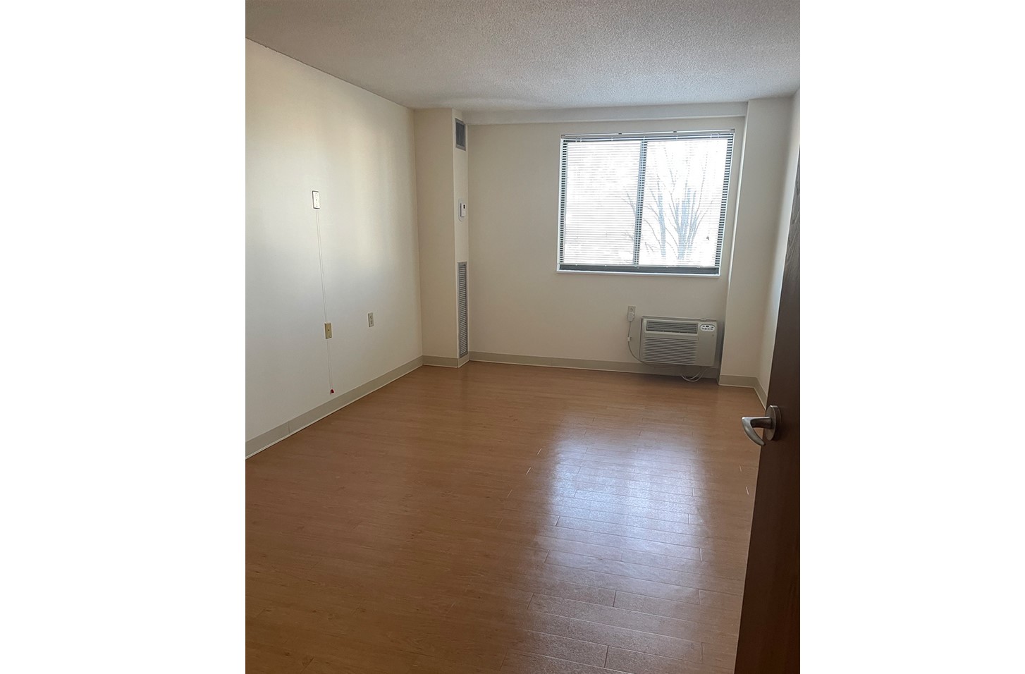 5 Green Street, Unit 100 Dover, NH 03820 - Photo 8 of 10 a view of an empty room with a window