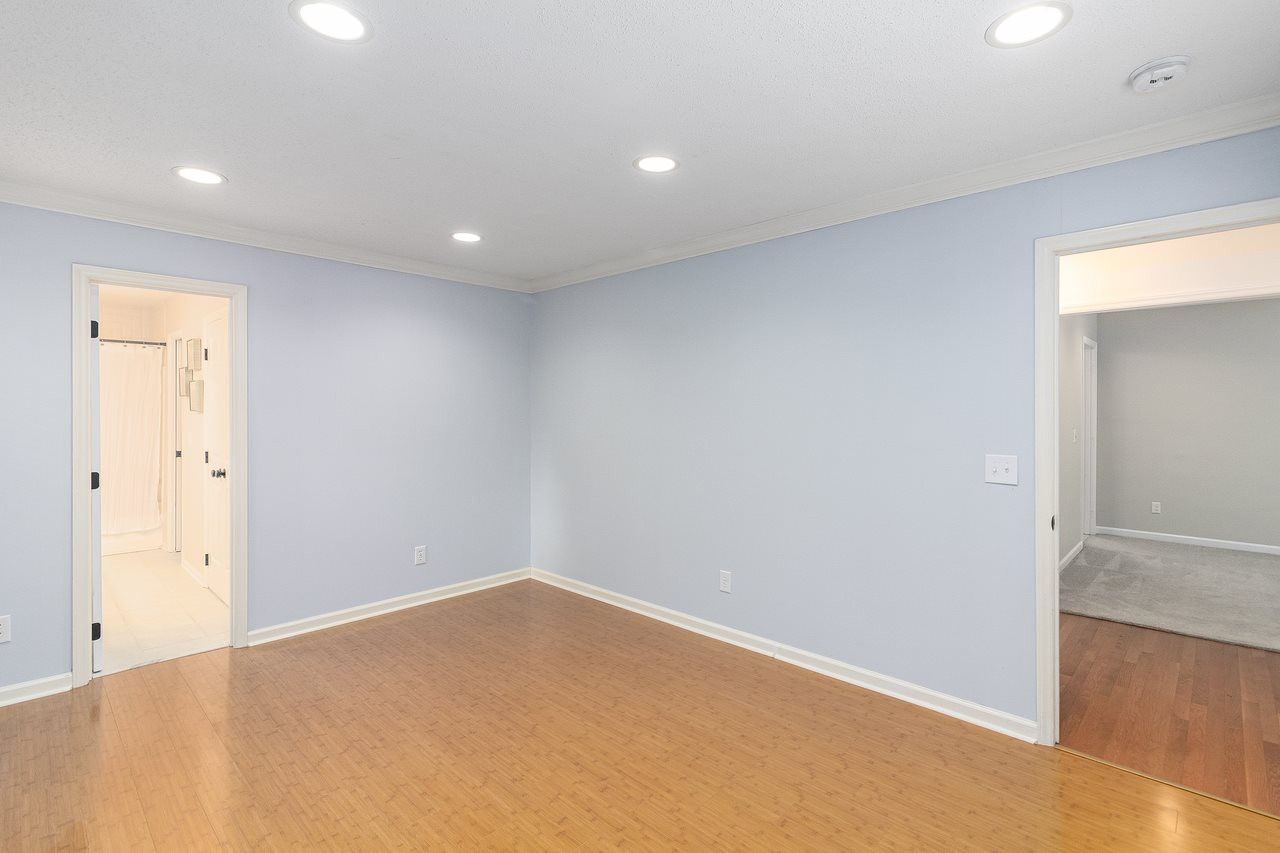 4704 Dillingham Court Raleigh, NC 27604 - Photo 8 of 10 Spacious first floor master bedroom makes main floor living a breeze. Master Bedroom