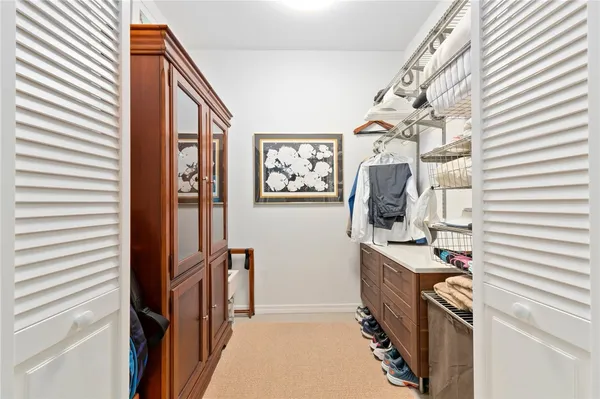 a bathroom with a sink a mirror and a shower curtain