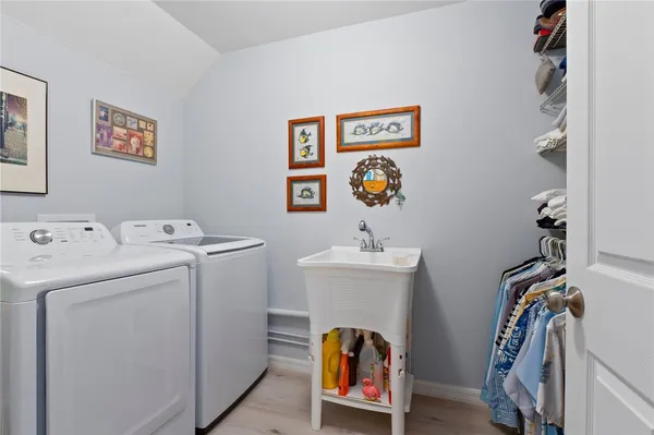 a utility room with dryer and washer