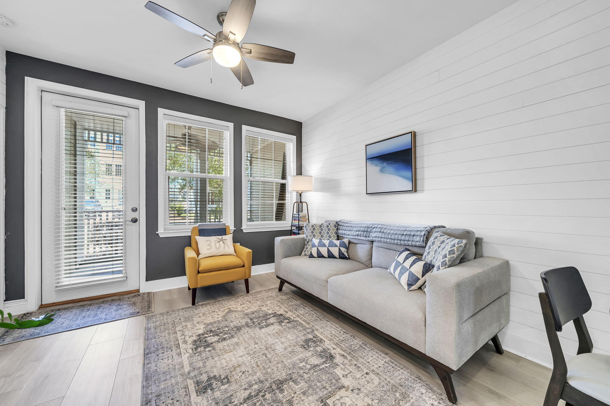 117 Village Boulevard, Unit 711 Santa Rosa Beach, FL 32459 - Photo 10 of 47 a living room with furniture and a large window