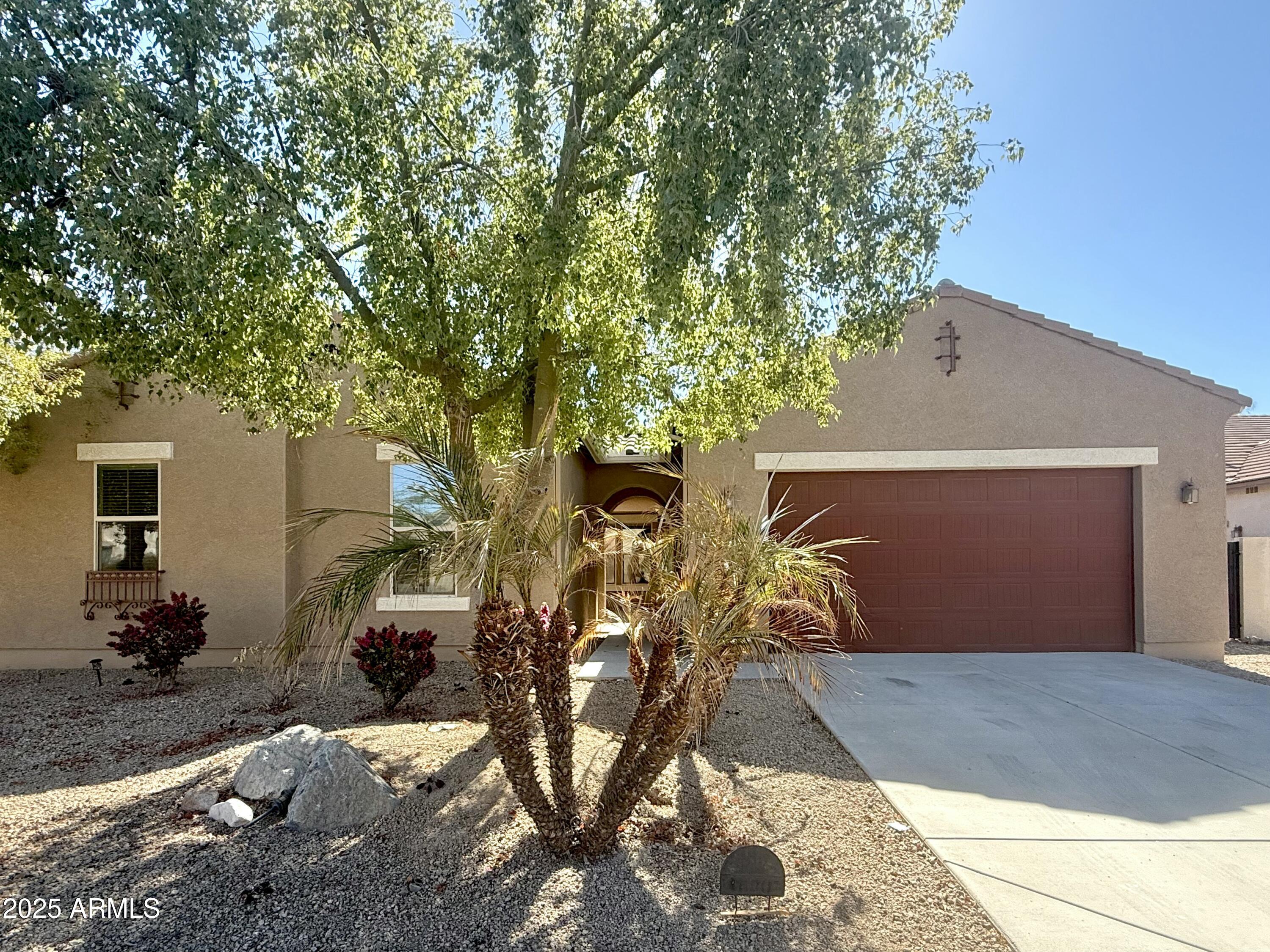 16205 West Berkeley Road Goodyear, AZ 85395 - Photo 1 of 32 Front garage walk way