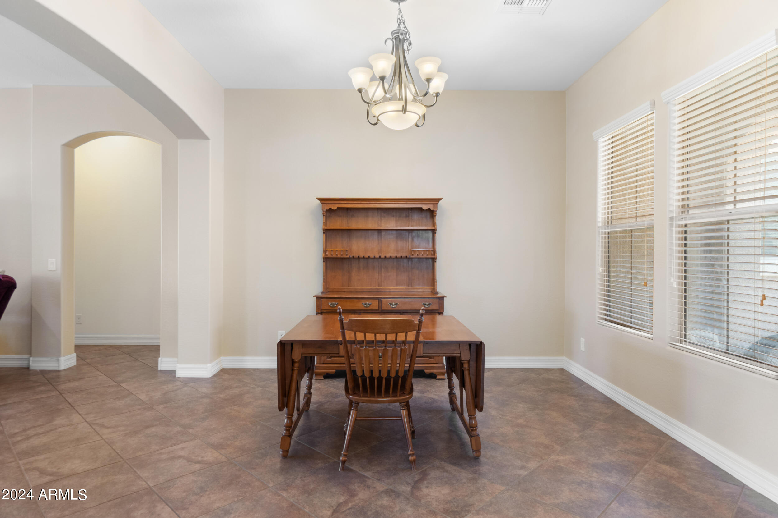 16205 West Berkeley Road Goodyear, AZ 85395 - Photo 13 of 32 Formal Dining room