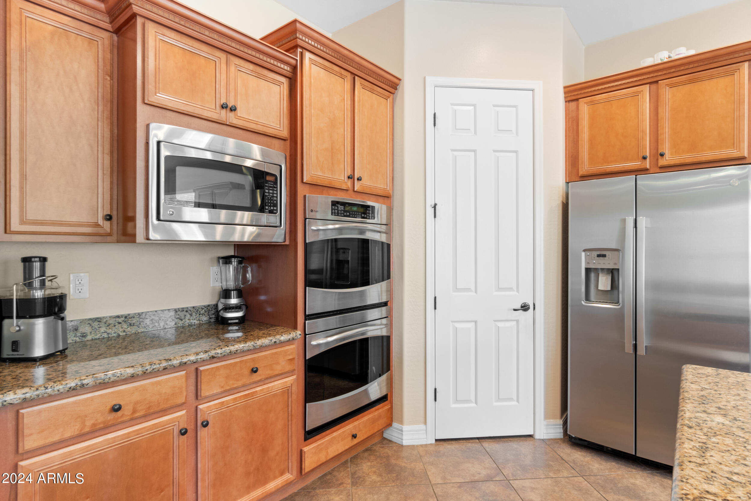 16205 West Berkeley Road Goodyear, AZ 85395 - Photo 6 of 32 Double oven and pantry