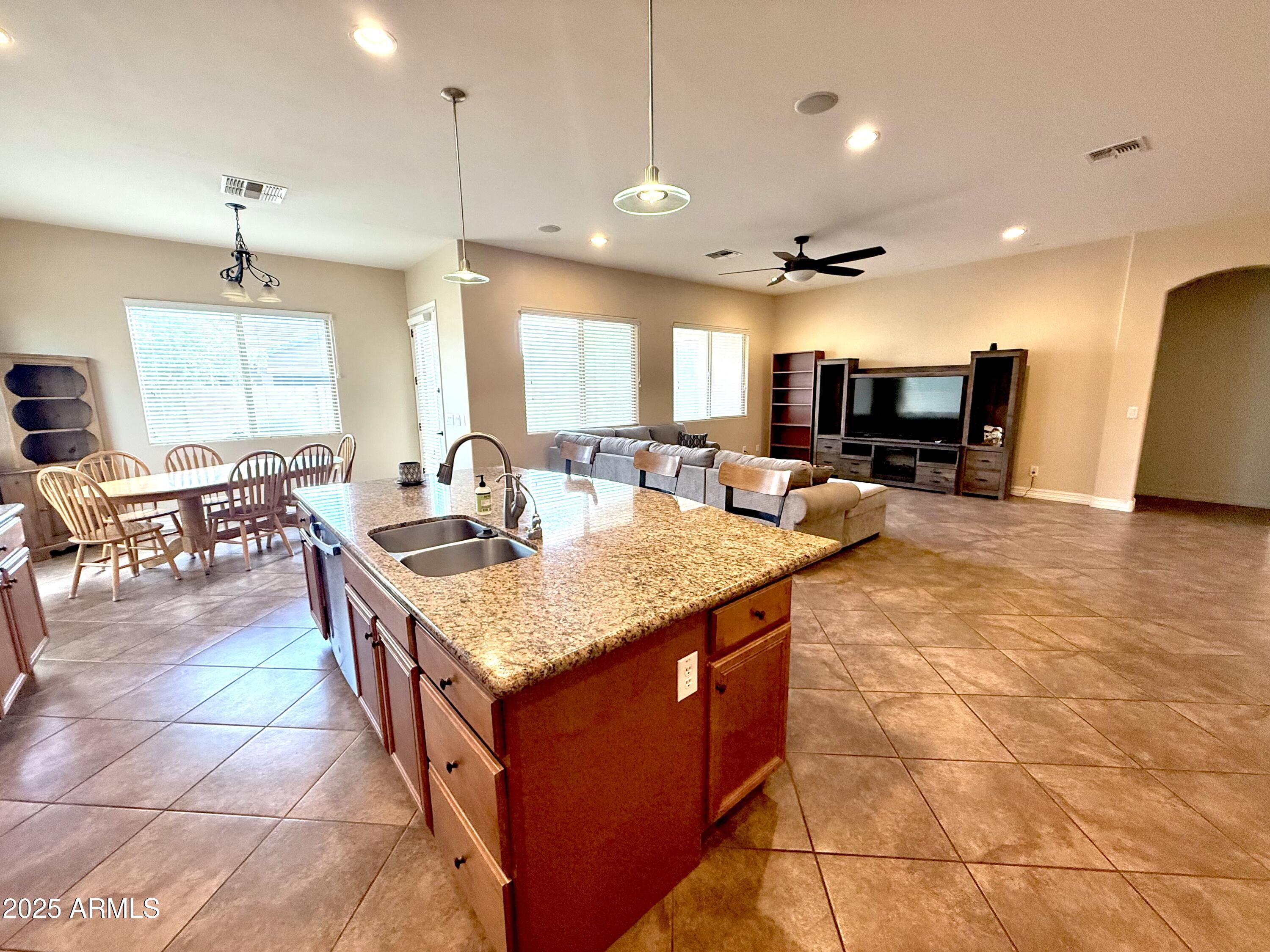 16205 West Berkeley Road Goodyear, AZ 85395 - Photo 8 of 32 2_Kitchen dining living room