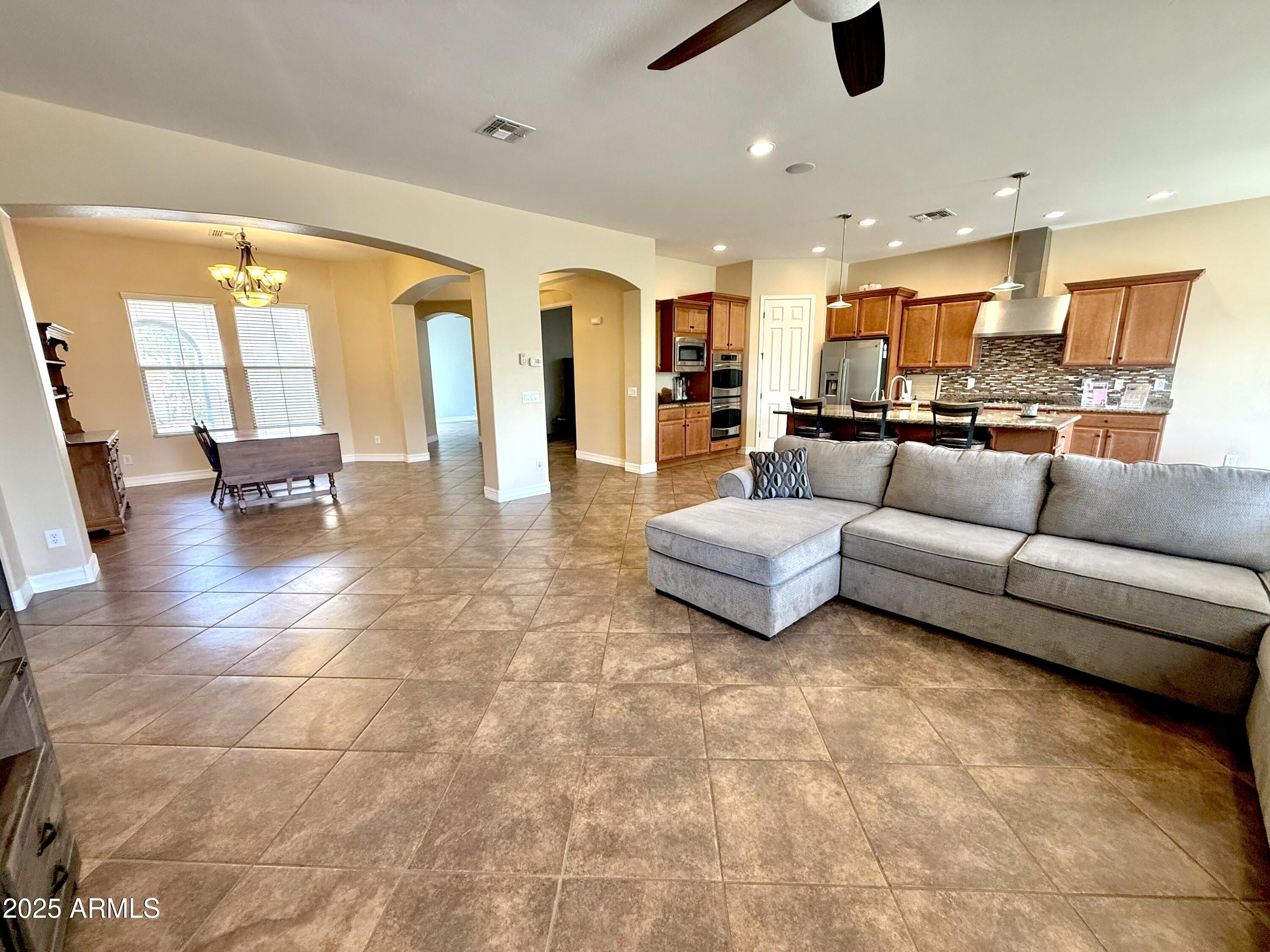 16205 West Berkeley Road Goodyear, AZ 85395 - Photo 10 of 32 2_Living room and formal dining