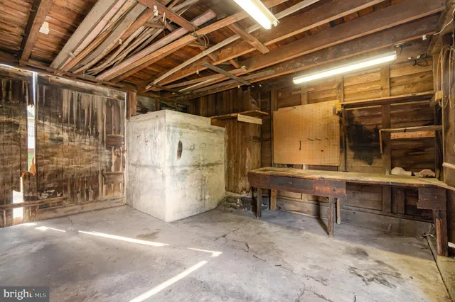 a view of a room with wooden walls